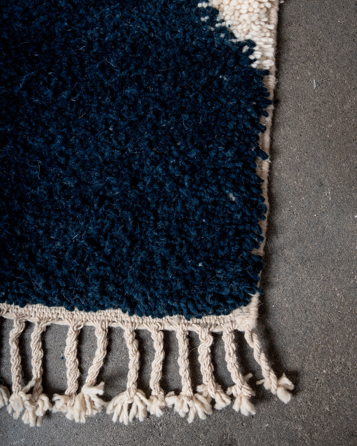 Modern, designer, handcrafted Berber rug from Morocco. Beniourain carpet with beautiful colours and patterns and fluffy wool texture.